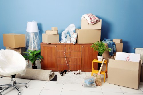 Careful handling of household items during a Woodside Park man and van move