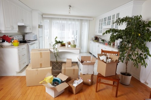 Loading household items into a moving van in North London