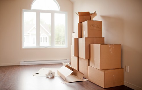 Office removals planning in Woodside Park with moving boxes and workspace setup