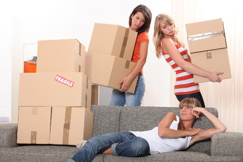 Loading furniture into a removals truck for a Woodside Park move
