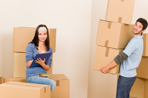 Packed moving boxes ready for collection in a Woodside Park home